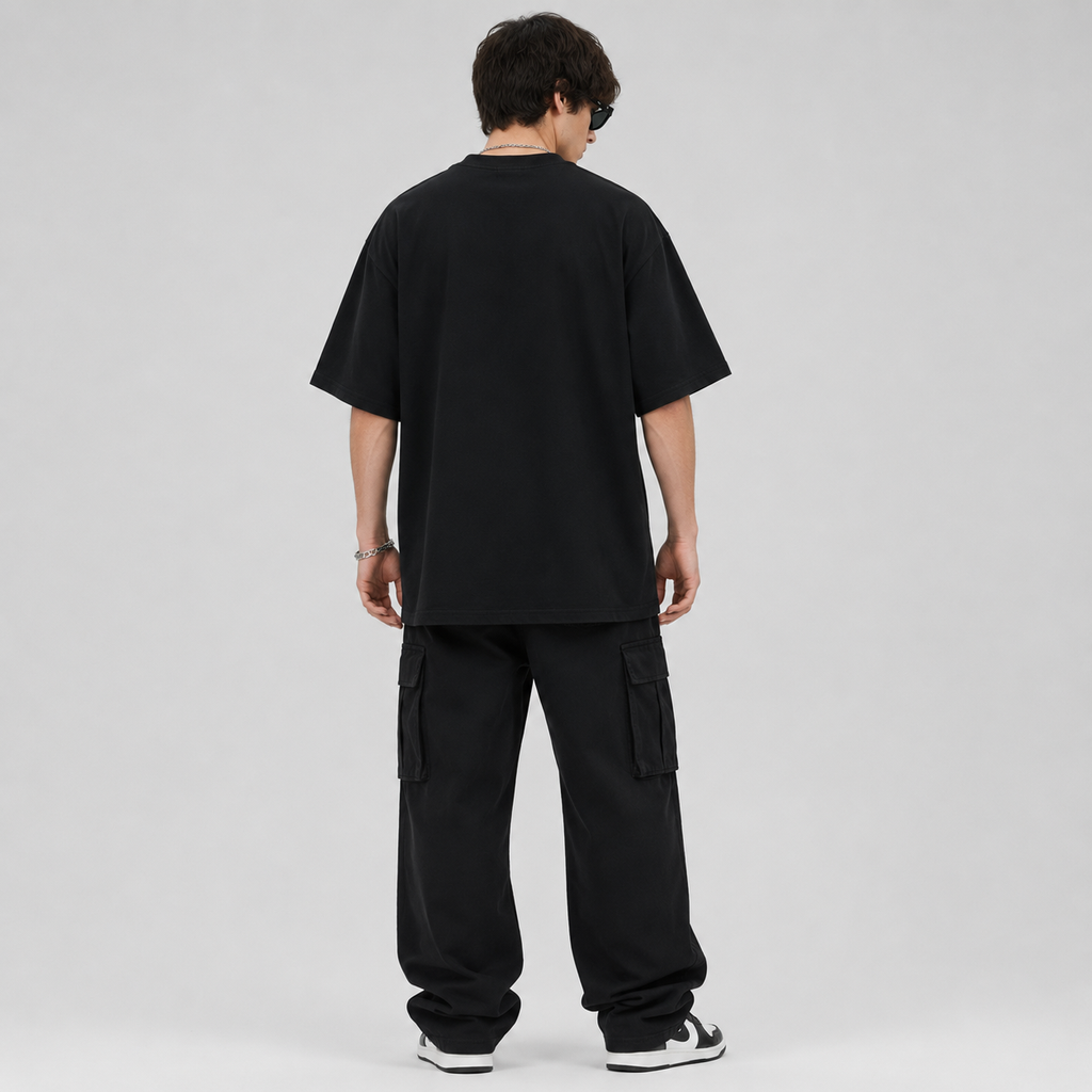 Back view of a men's oversized black t-shirt