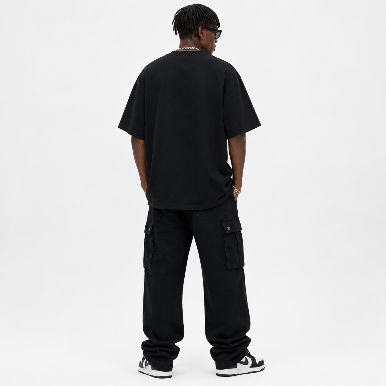 Back view of a men's oversized black t-shirt