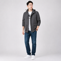 Man wearing a lightweight hooded jacket in gray