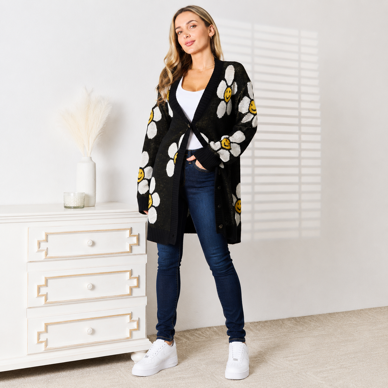 Women's floral cardigan sweater with button-front design