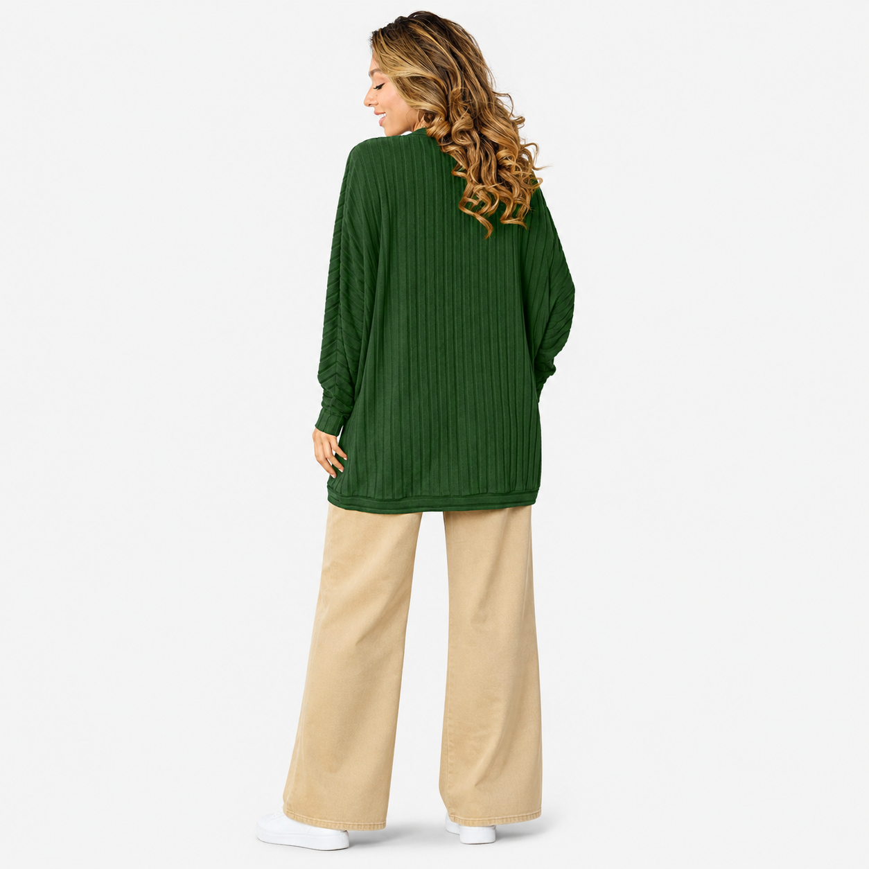 Women's relaxed cardigan paired with beige trousers