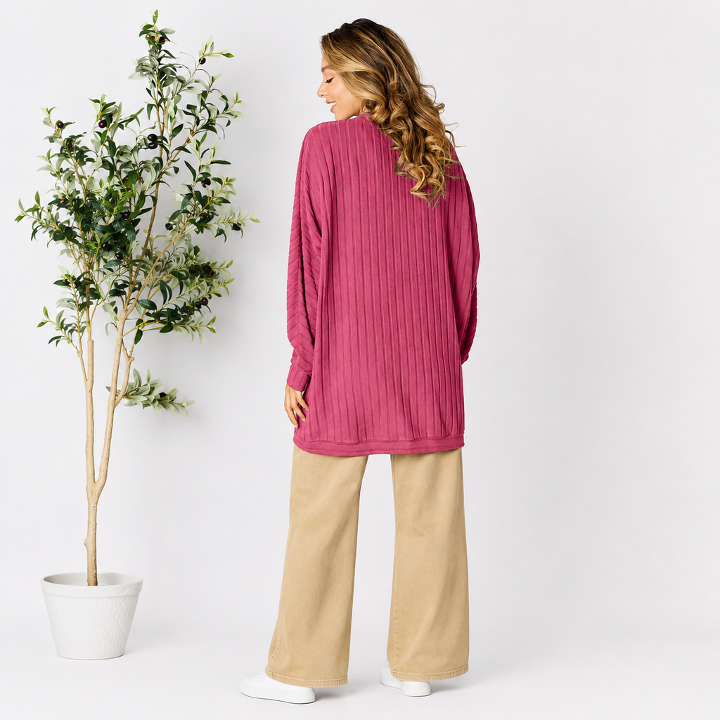 Front view of a women's black layering cardigan