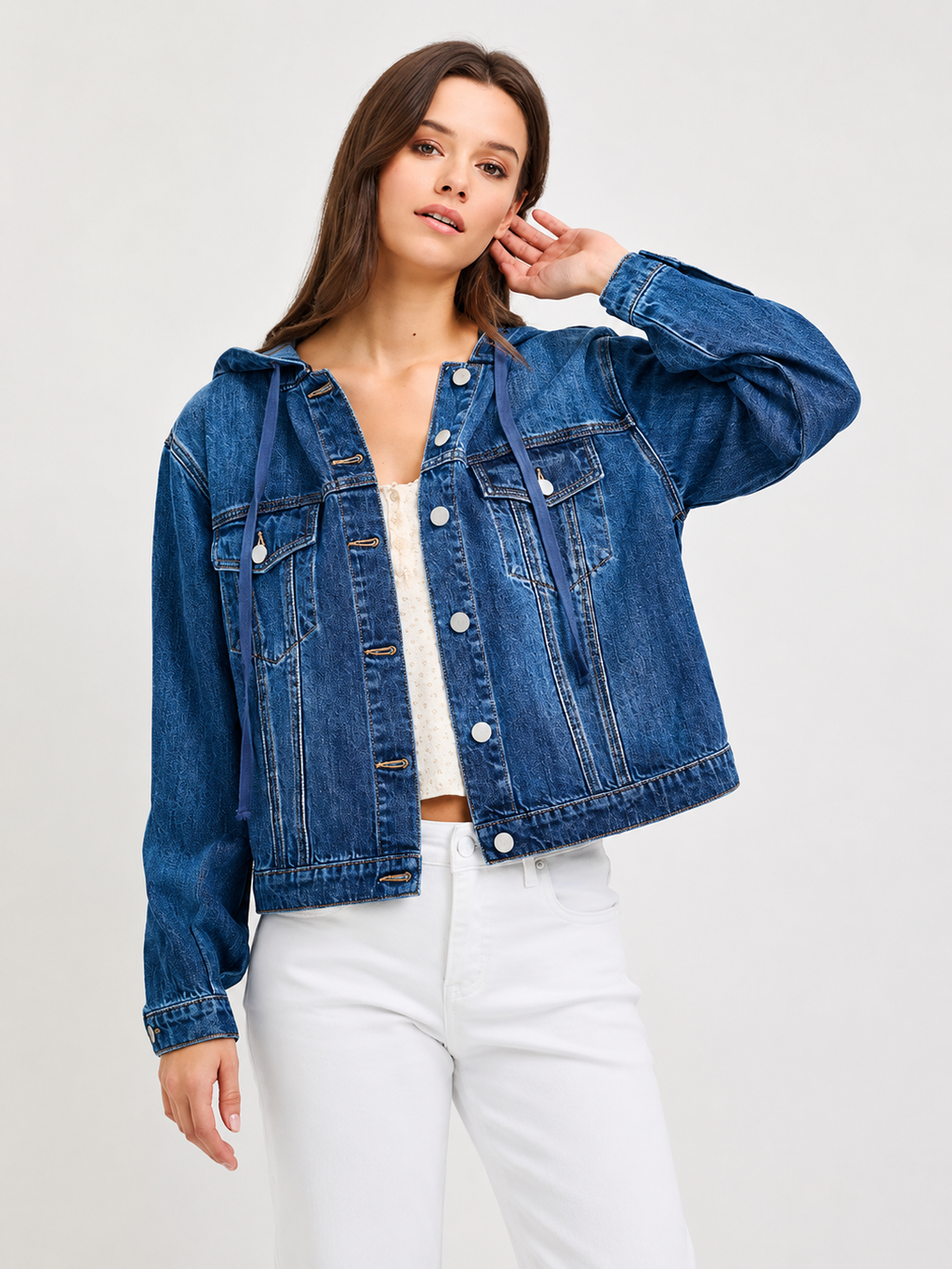 Front view of a women's denim jacket with hood